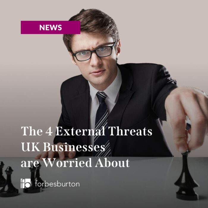 businessman playing chess