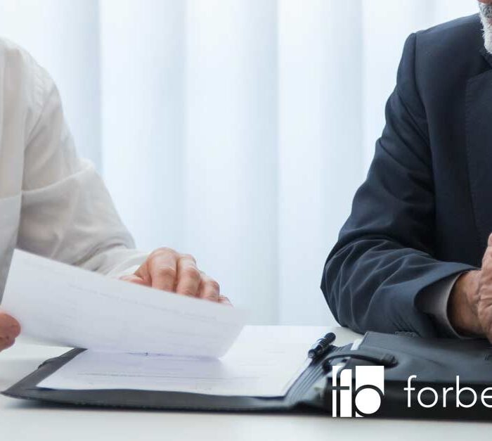 two people discussing company voluntary arrangements