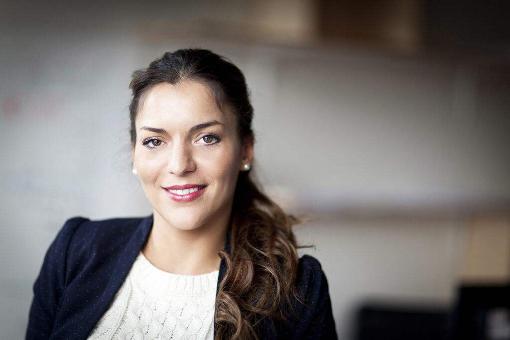 Business Woman Smiling At the Camera