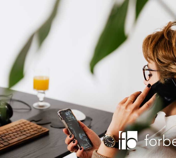 Woman on the phone asking for help on what would happen if she didn't pay her bounce back loan