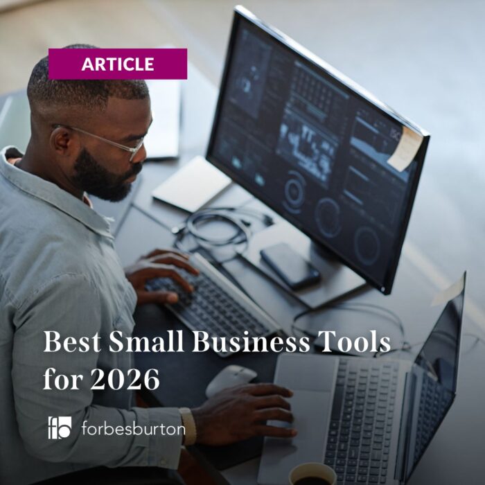 businessman using one of the best small business tools of 2026, probably.