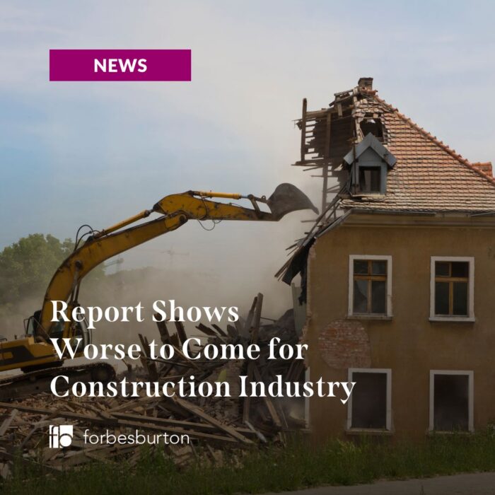 digger demolishes house