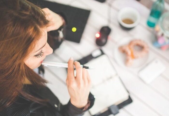 woman contemplating business affairs