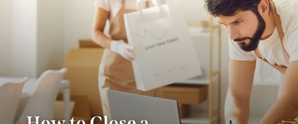 people trying to close a franchise business on their laptop