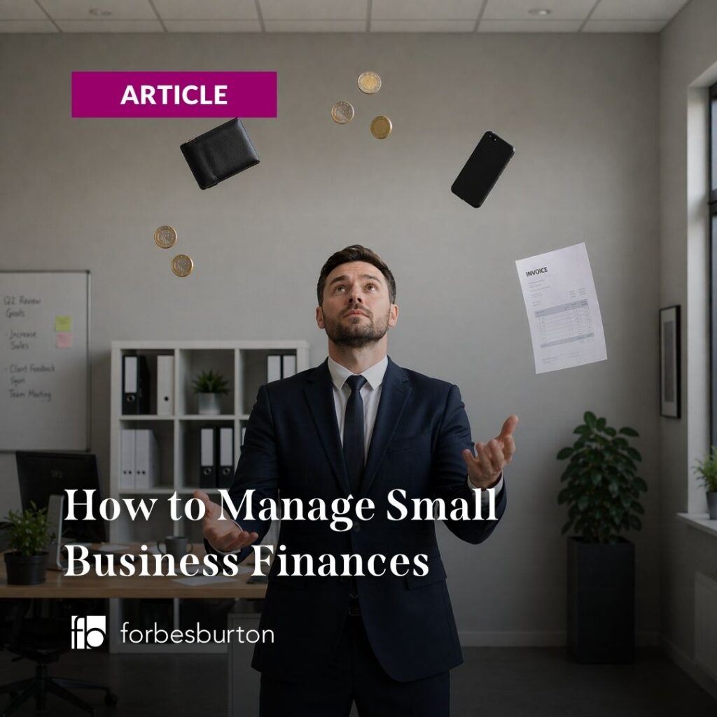 businessman wondering how to manage his small business finances while literally juggling money, an invoice, a wallet and a phone in an office