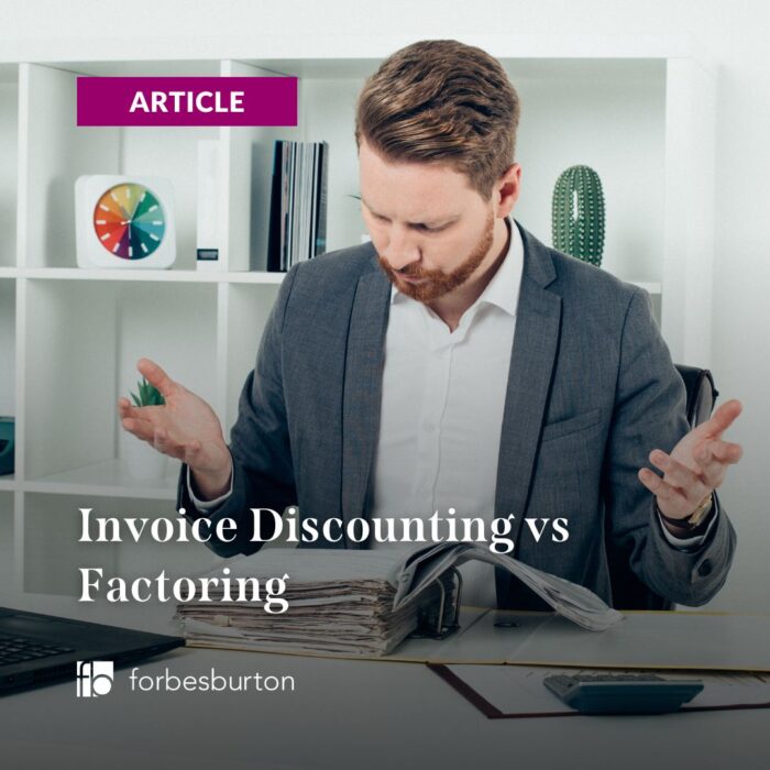 A businessman with arms in the air in a clumsy attempt as if weighing up the merits of invoice discounting vs factoring.