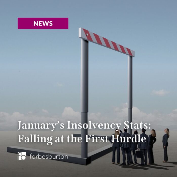 giant hurdle in front of group of business people