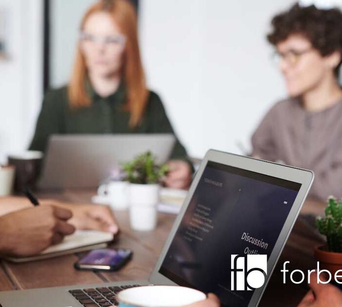 people meeting about selling a business