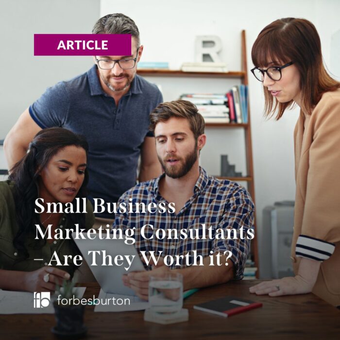 a small business marketing consultant explaining his strategy to stakeholders