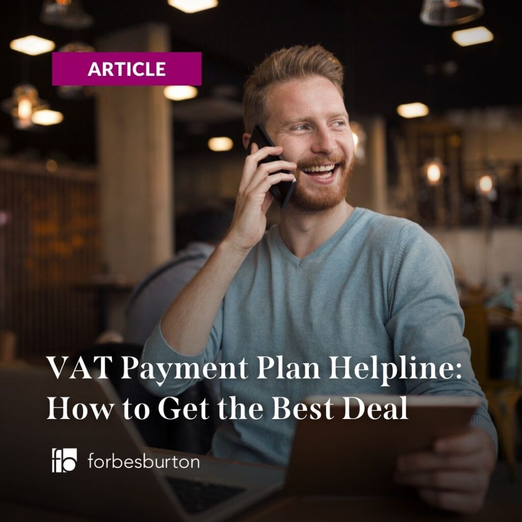 a chap looking happy on his mobile. Maybe he called our VAT payment plan helpline. Certainly looks like it