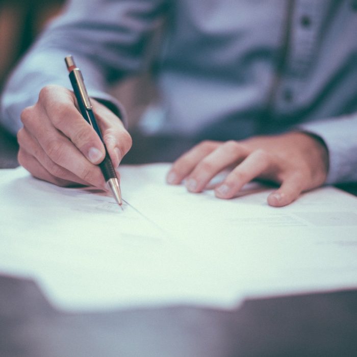 Man Writing Up Plans